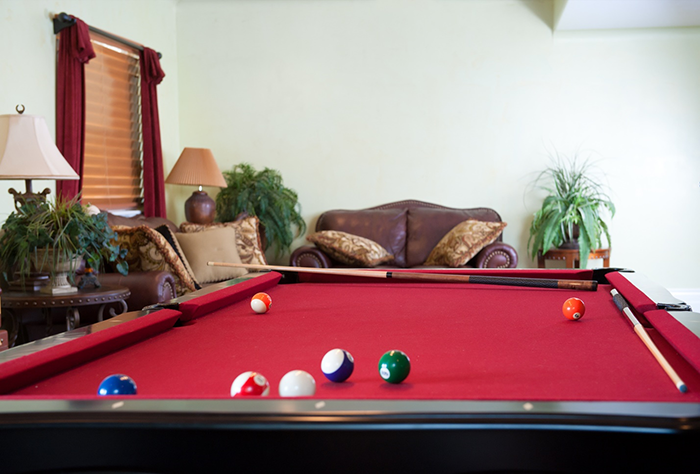Pool table in a game room